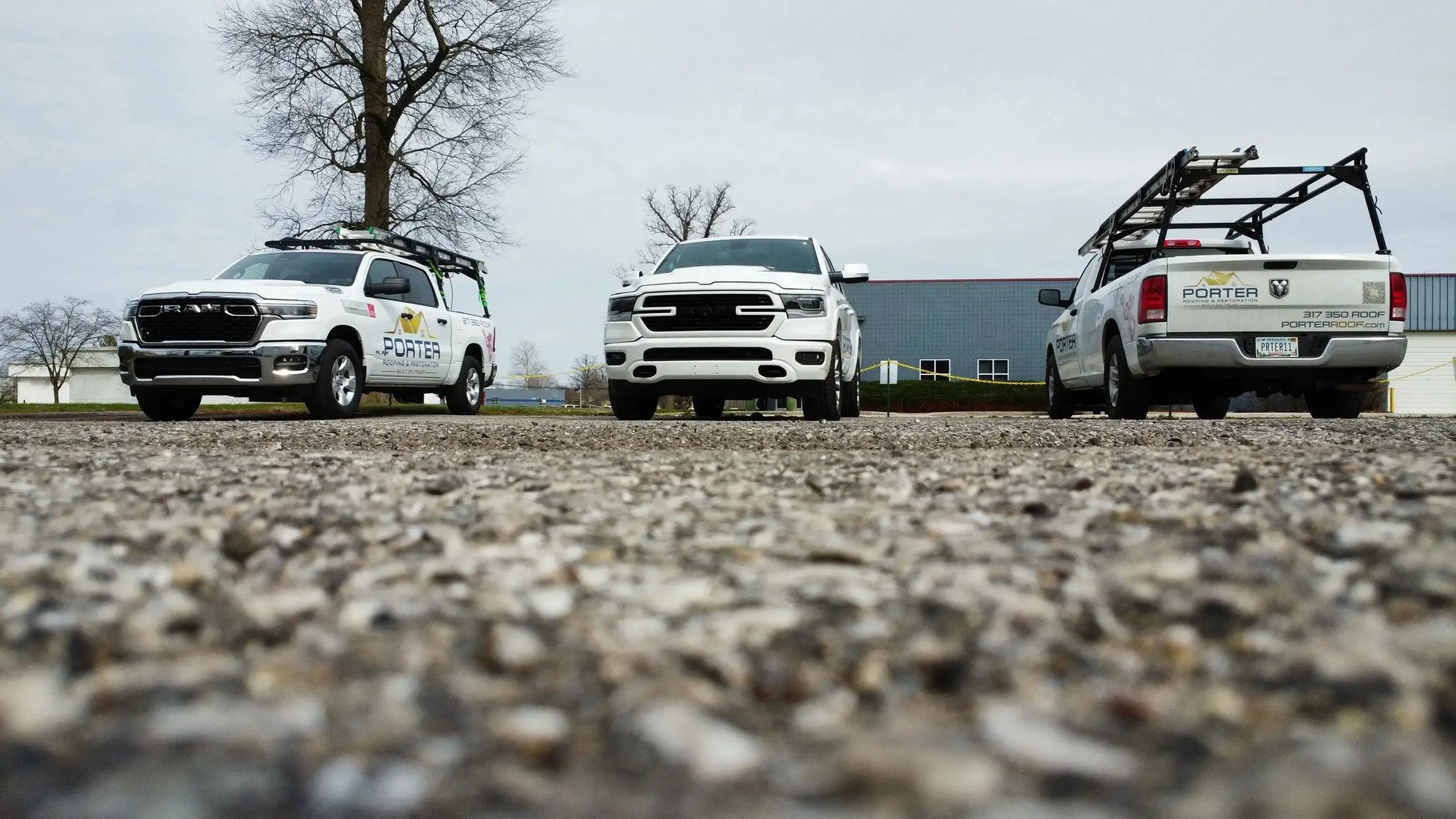 Porter Roofing Trucks