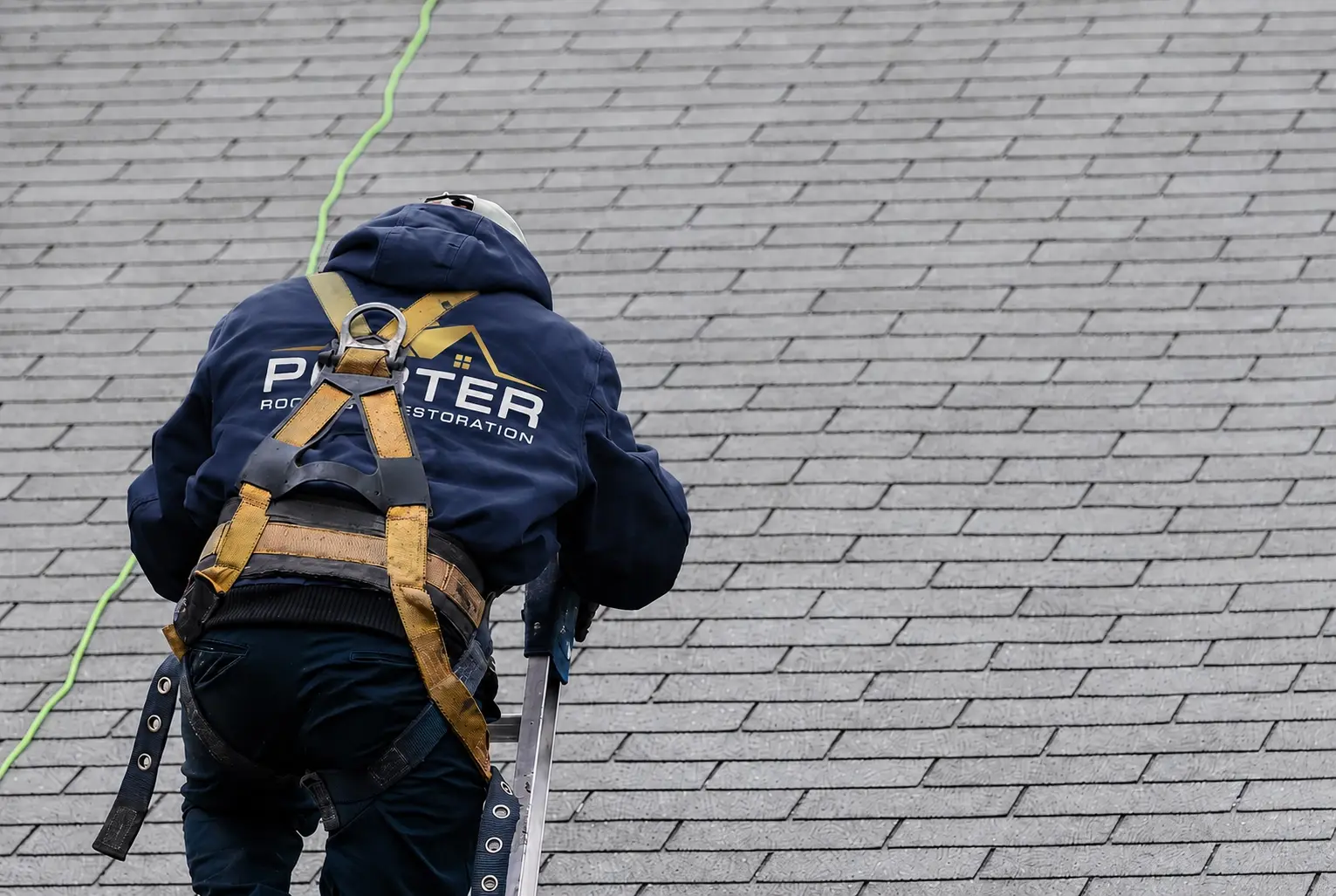 Porter worker on roof